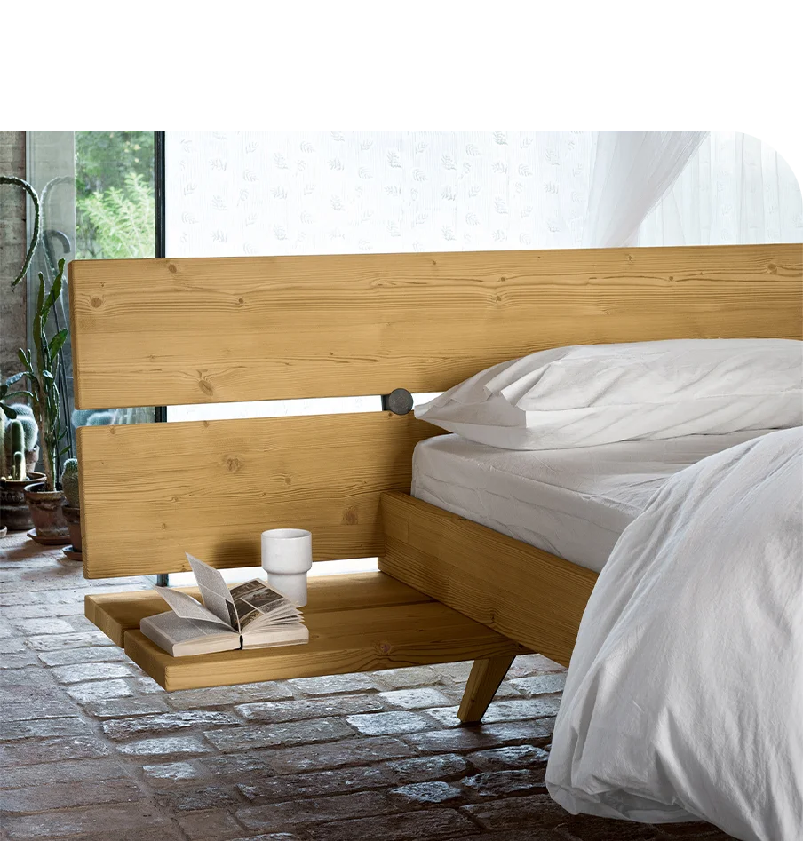 letto-matrimoniale-con-comodino-annesso